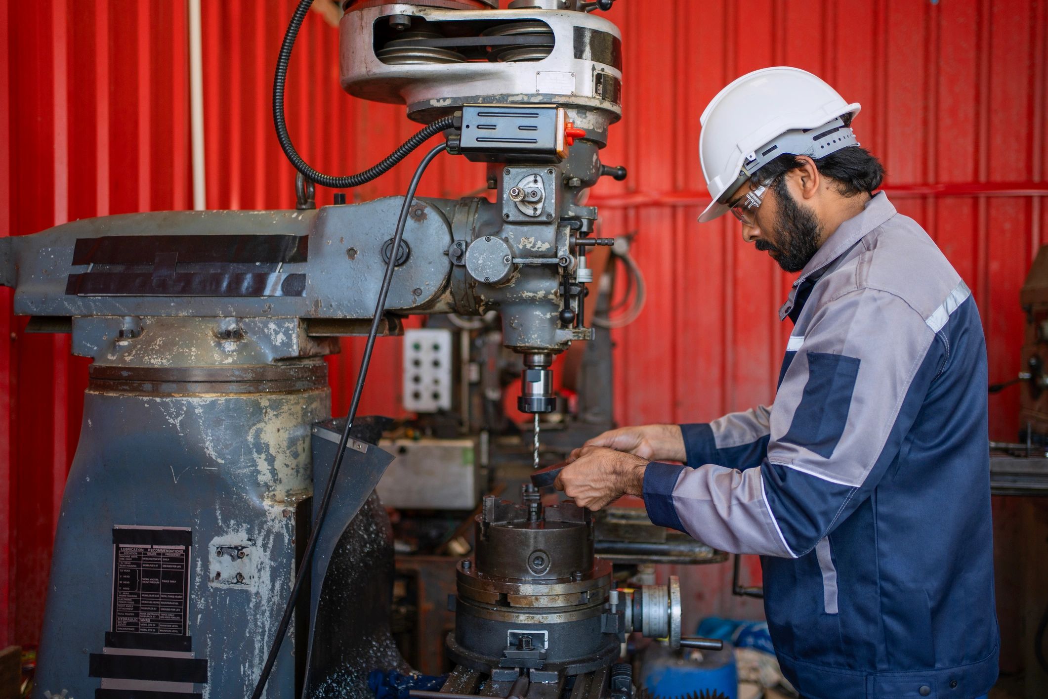 Technician at work representing Tom's Well Service