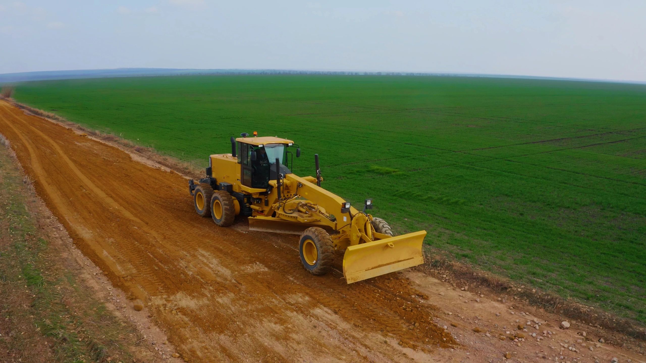 Heavy equipment working on a rural service project